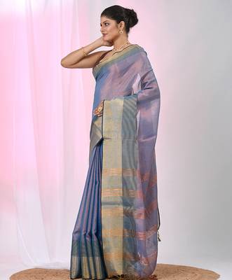 Elegant blue tissue saree with contrasting golden border 2