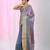 Elegant blue tissue saree with contrasting golden border