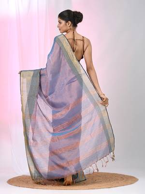 Elegant blue tissue saree with contrasting golden border 3