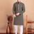Elegant navy blue kurta pyjama set with yellow thread embroidered geometric pattern & embellished neckline