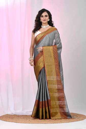 Elegant grey tissue saree with contrasting golden border
