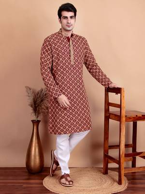 Elegant maroon kurta pyjama set with yellow thread embroidered geometric pattern & embellished neckline 1