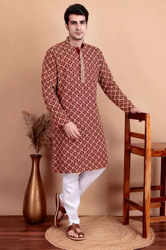 Elegant maroon kurta pyjama set with yellow thread embroidered geometric pattern & embellished neckline