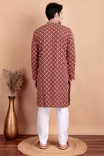 Elegant maroon kurta pyjama set with yellow thread embroidered geometric pattern & embellished neckline