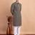 Elegant navy blue kurta pyjama set with yellow thread embroidered geometric pattern & embellished neckline