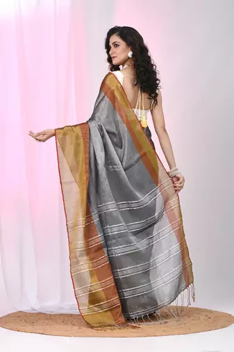 Elegant grey tissue saree with contrasting golden border