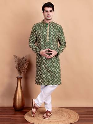 Elegant green kurta pyjama set with yellow thread embroidered geometric pattern & embellished neckline 1