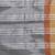 Elegant grey tissue saree with contrasting golden border