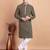 Elegant black kurta pyjama set with yellow thread embroidered geometric pattern & embellished neckline