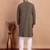 Elegant black kurta pyjama set with yellow thread embroidered geometric pattern & embellished neckline