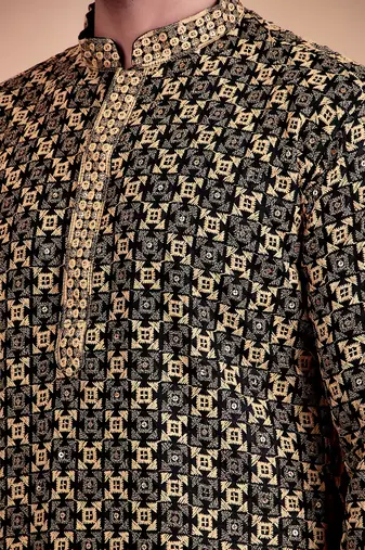Elegant black kurta pyjama set with yellow thread embroidered geometric pattern & embellished neckline