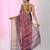 Elegant purple tissue saree with contrasting golden border