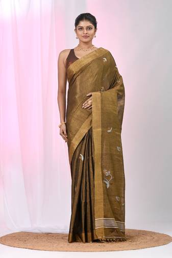 Metallic tissue saree with ethnic motifs and golden border