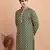 Elegant green kurta with yellow thread embroidered geometric pattern & embellished neckline