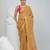 Beige tissue saree with ethnic motifs and golden border