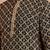 Elegant black kurta with yellow thread embroidered geometric pattern & embellished neckline