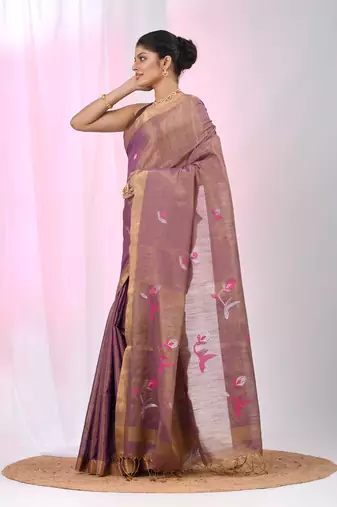 Purple tissue saree with ethnic motifs and golden border
