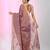 Purple tissue saree with ethnic motifs and golden border