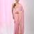 Baby pink tissue saree with ethnic motifs and golden border