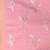 Baby pink tissue saree with ethnic motifs and golden border