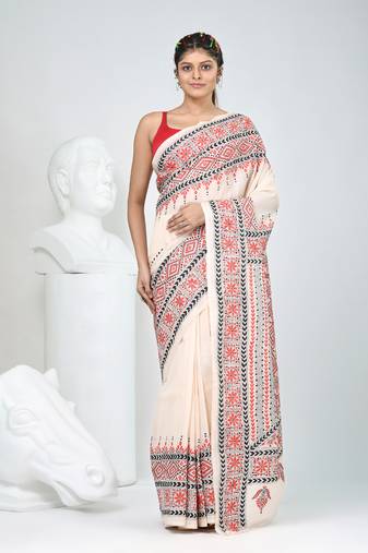 Elegant beige tussar silk kantha stitch saree with red and black geometric motifs