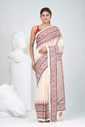 Elegant beige tussar silk kantha stitch saree with red and black geometric motifs