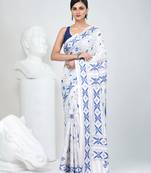 White silk blend kantha stitch saree with peacock & floral motifs