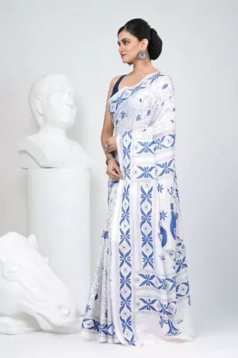 White silk blend kantha stitch saree with peacock & floral motifs