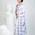 White silk blend kantha stitch saree with peacock & floral motifs