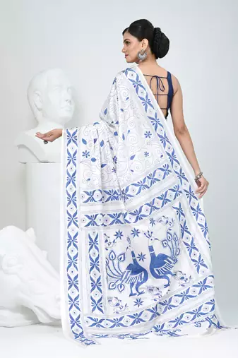 White silk blend kantha stitch saree with peacock & floral motifs