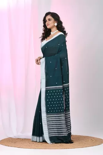 Teal cotton saree with white border and woven patterns