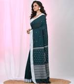 Teal cotton saree with white border and woven patterns