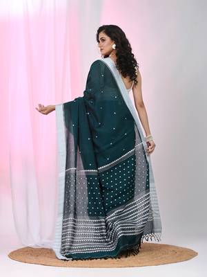 Teal cotton saree with white border and woven patterns 2