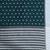 Teal cotton saree with white border and woven patterns