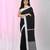 Black cotton saree with white border and woven patterns
