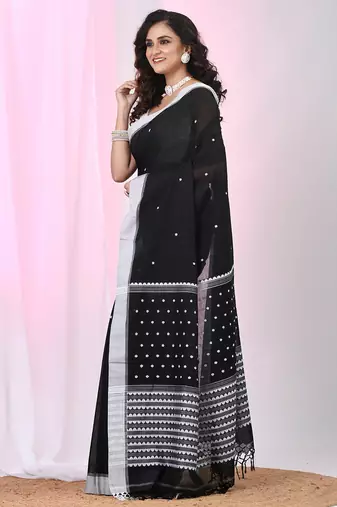 Black cotton saree with white border and woven patterns