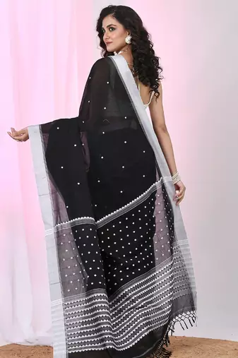 Black cotton saree with white border and woven patterns