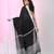 Black cotton saree with white border and woven patterns