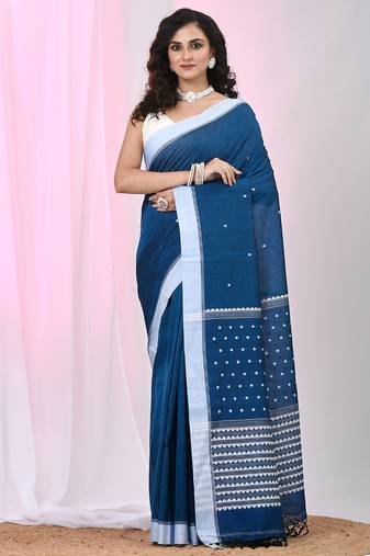 Sapphire blue cotton saree with white border and woven patterns