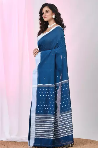 Sapphire blue cotton saree with white border and woven patterns