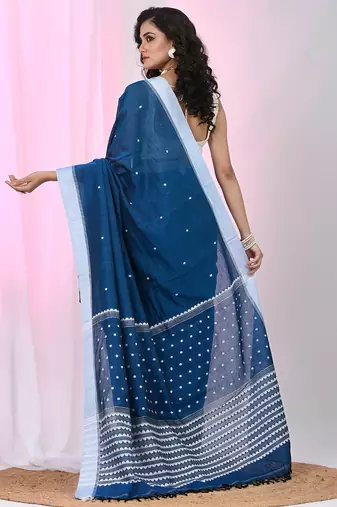 Sapphire blue cotton saree with white border and woven patterns