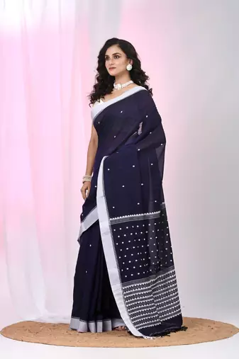 Dark purple cotton saree with white border and woven patterns
