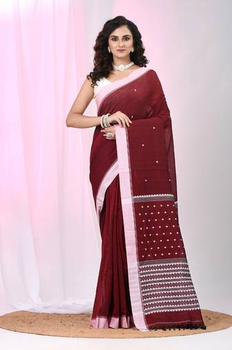 Red cotton saree with white border and woven patterns