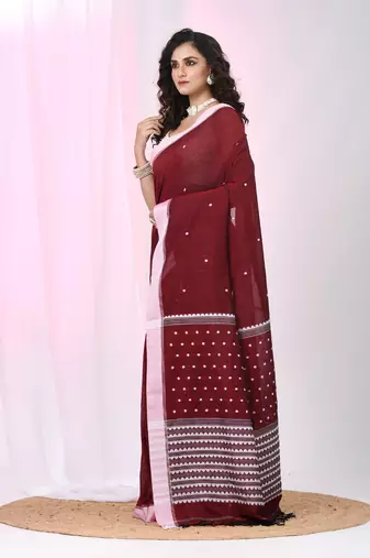 Red cotton saree with white border and woven patterns
