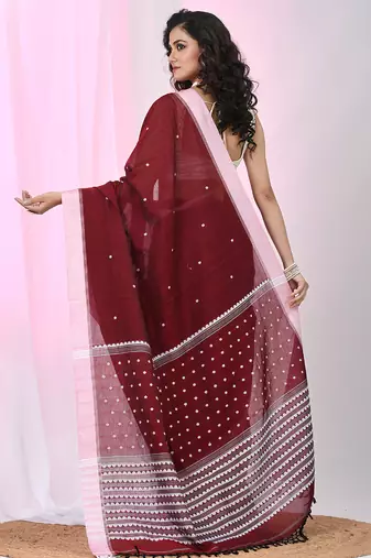 Red cotton saree with white border and woven patterns