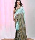 Sea green cotton saree with intricate striped border and tassels