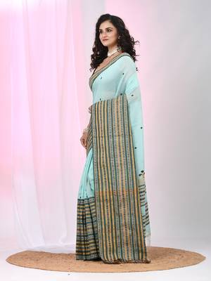 Sea green cotton saree with intricate striped border and tassels 2