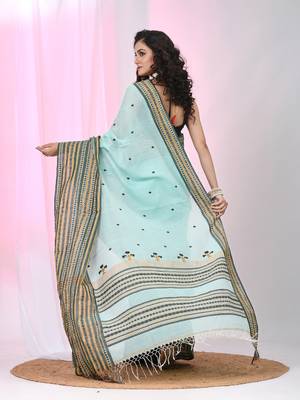 Sea green cotton saree with intricate striped border and tassels 3