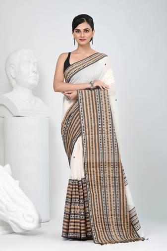 Off white cotton saree with intricate striped border and tassels