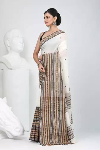 Off white cotton saree with intricate striped border and tassels